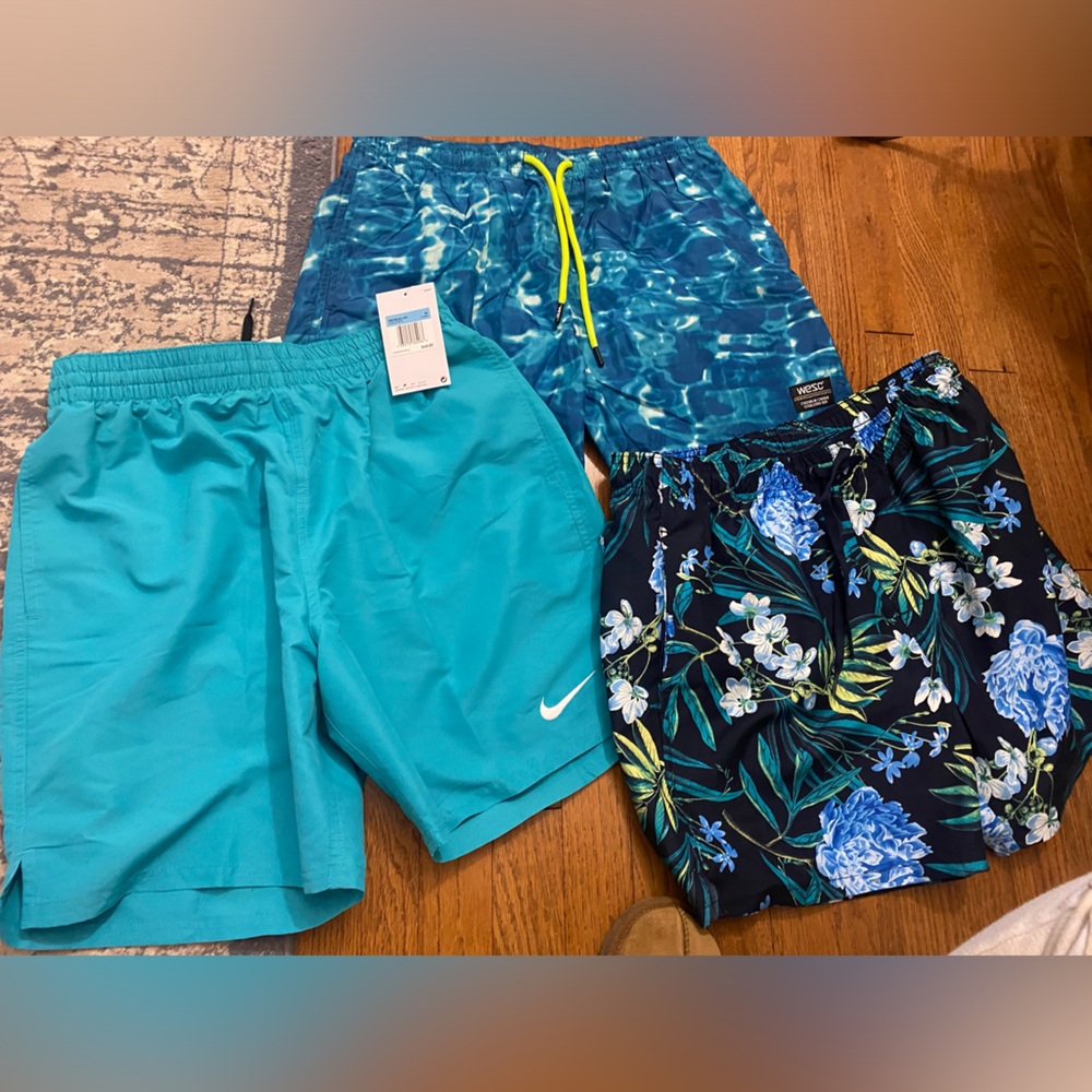 3 pack men’s size M swim trunks . One was $48 and tags still on